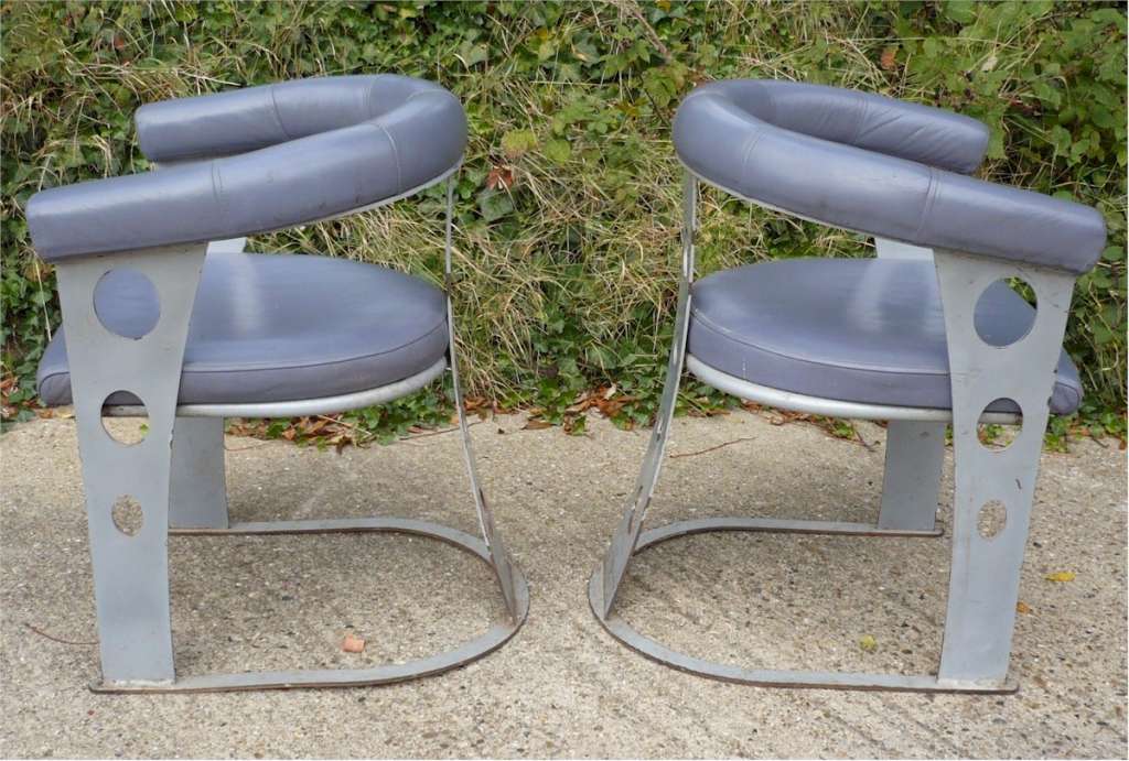 Pair of upholstered steel armchairs