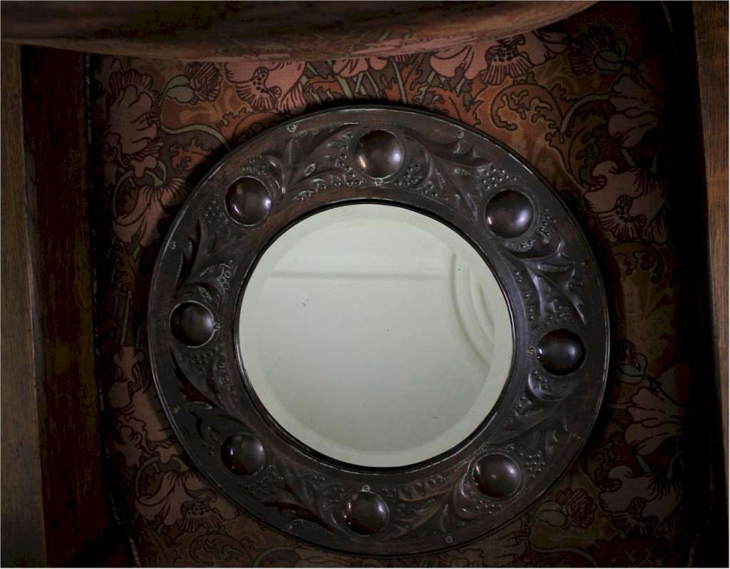 Arts and Crafts Keswick copper mirror.