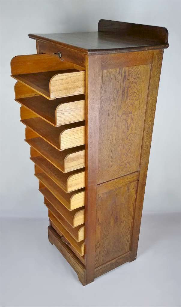 Tambour front filing cabinet in oak