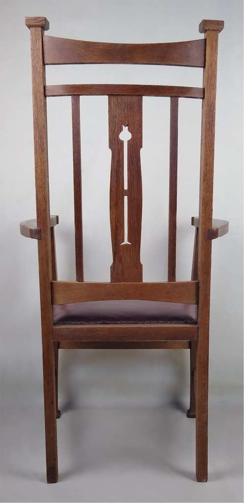 Single arts and crafts armchair in oak