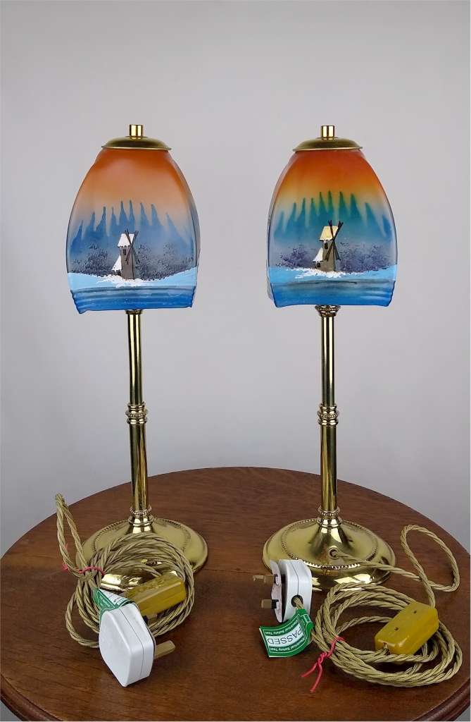 Pair of arts and crafts lights hand painted shades