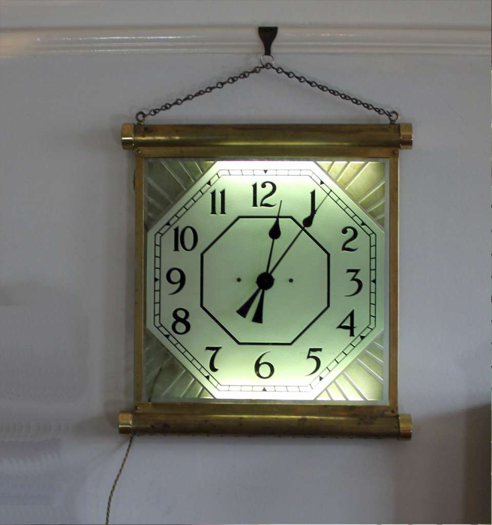 1930's brass illuminated Cinema clock. Made in England by "internalite