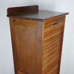 Tambour front filing cabinet in oak