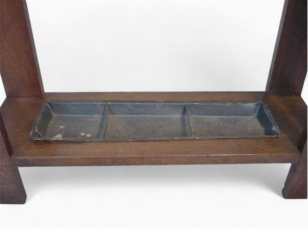 Arts and crafts umbrella stand in oak with stylised