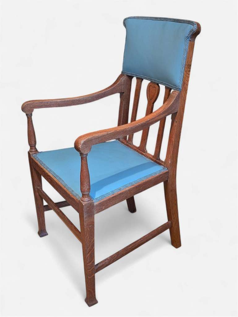 Arts and crafts armchair with carved heart decoration