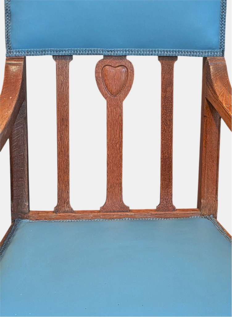 Arts and crafts armchair with carved heart decoration