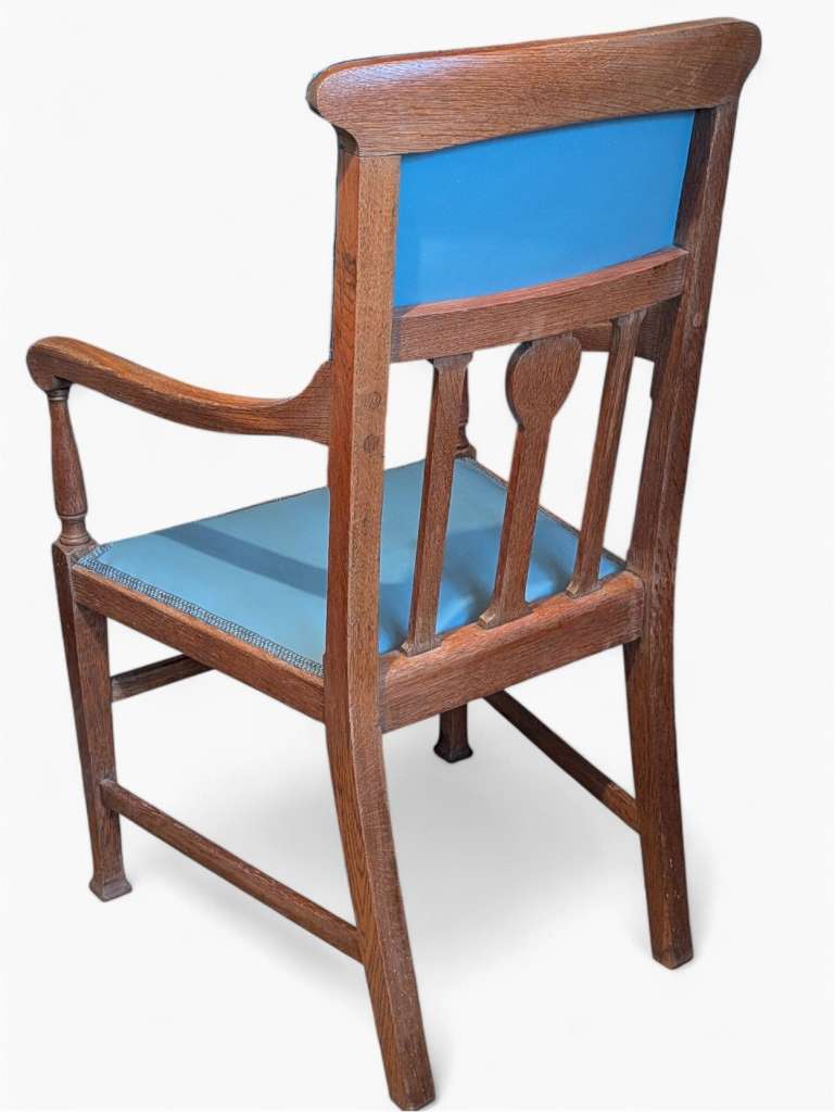 Arts and crafts armchair with carved heart decoration