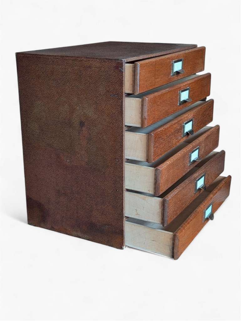 Tabletop filing cabinet holds A4 paper