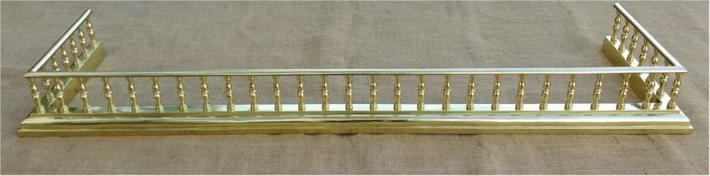  Fireside fender in polished brass