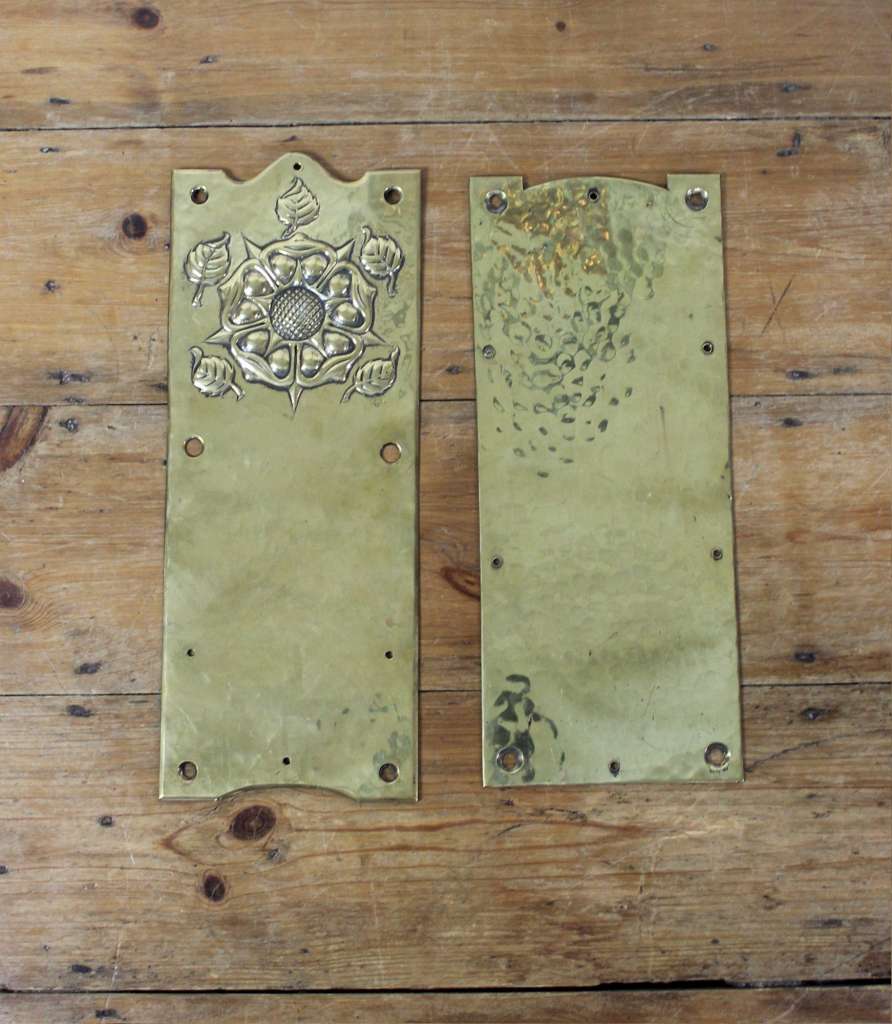 Pair of arts and crafts brass finger plates