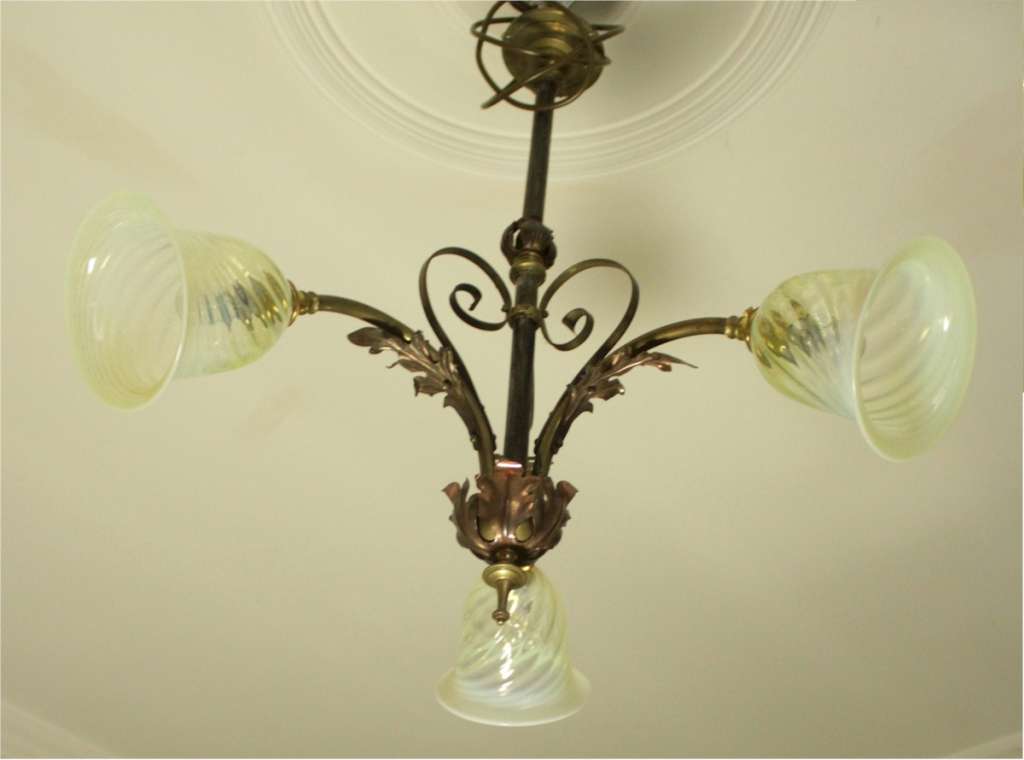 Arts and crafts three branch ceiling light in iron and copper