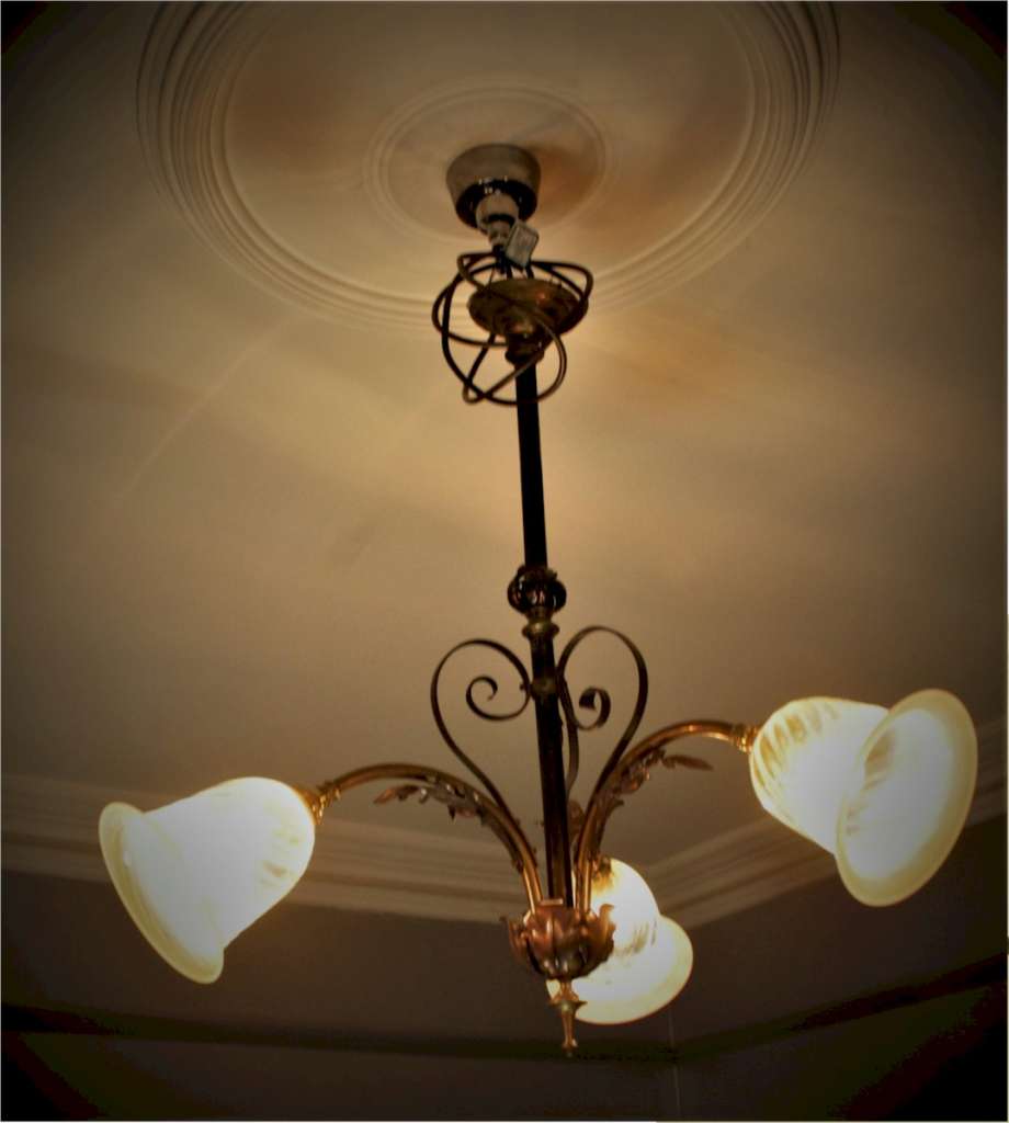 Arts and crafts three branch ceiling light in iron and copper