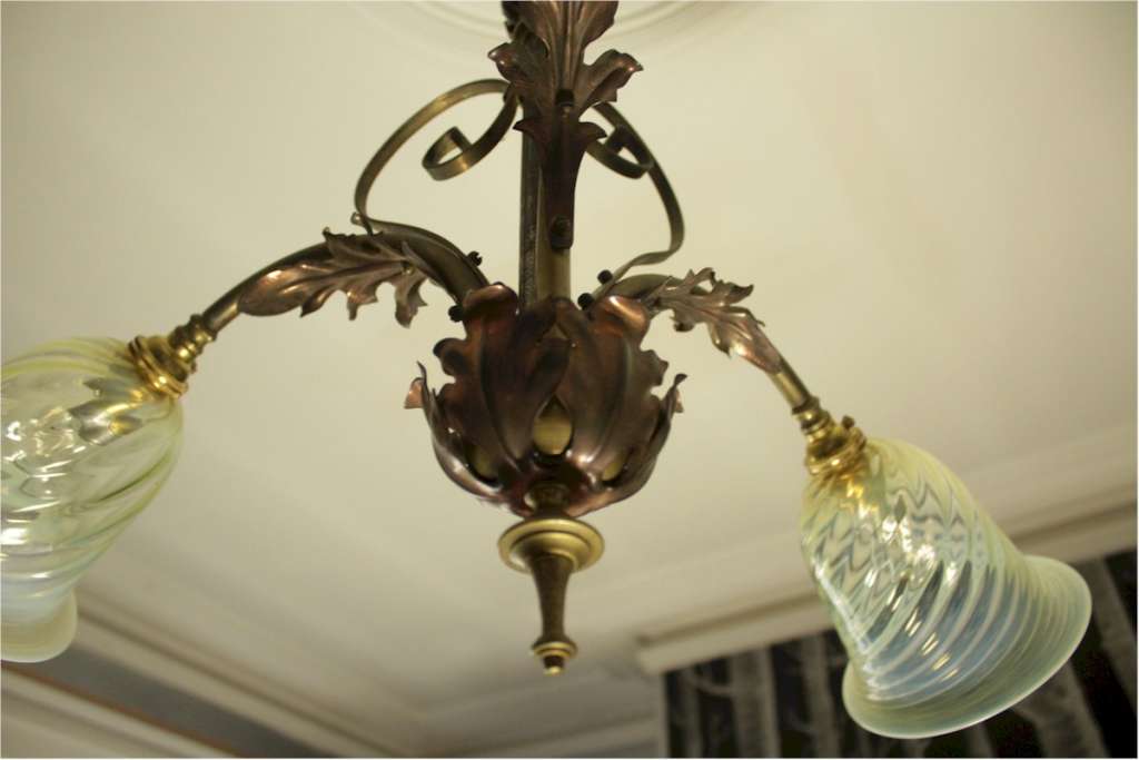 Arts and crafts three branch ceiling light in iron and copper