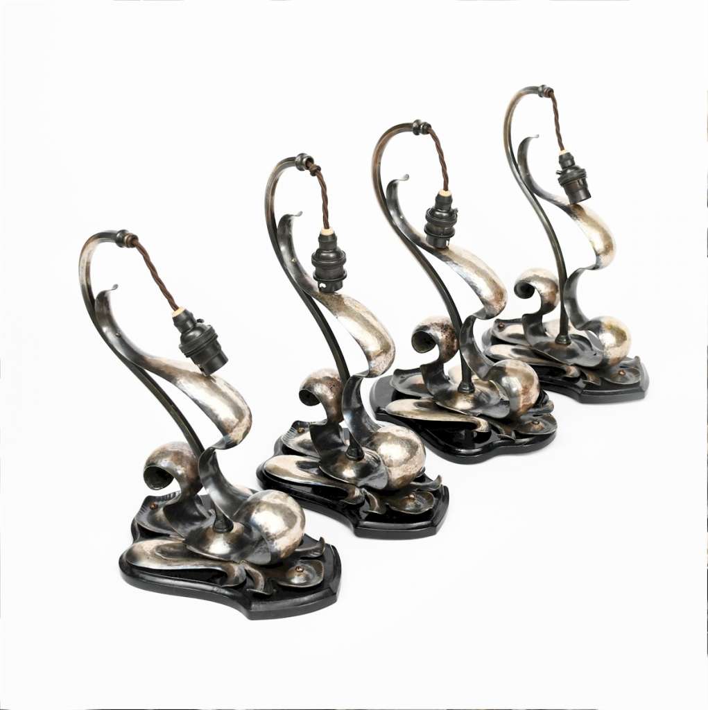 Set of Four arts and crafts silvered wall lights