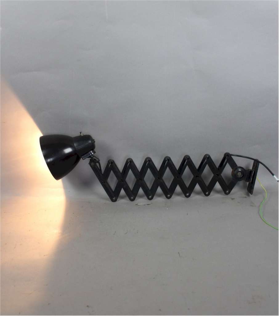Bauhaus scissor lamp. Wall mounted extending industrial lamp. Stamped