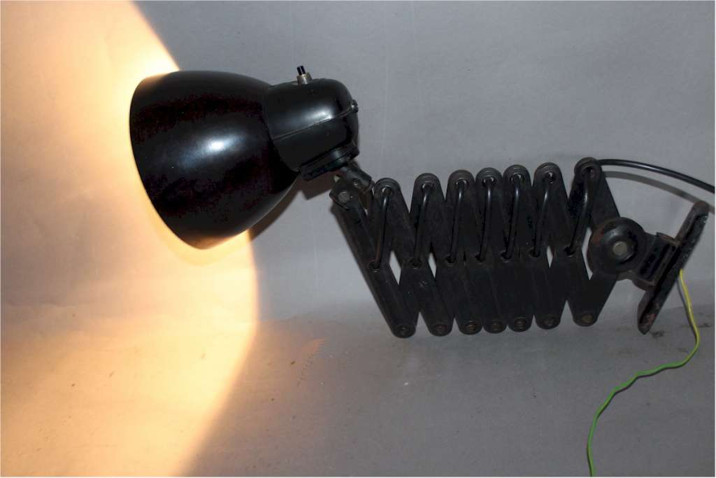 Bauhaus scissor lamp. Wall mounted extending industrial lamp. Stamped