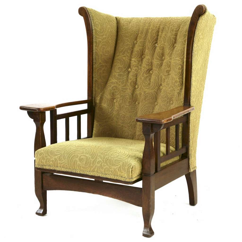 Arts and Crafts wing back oak armchair