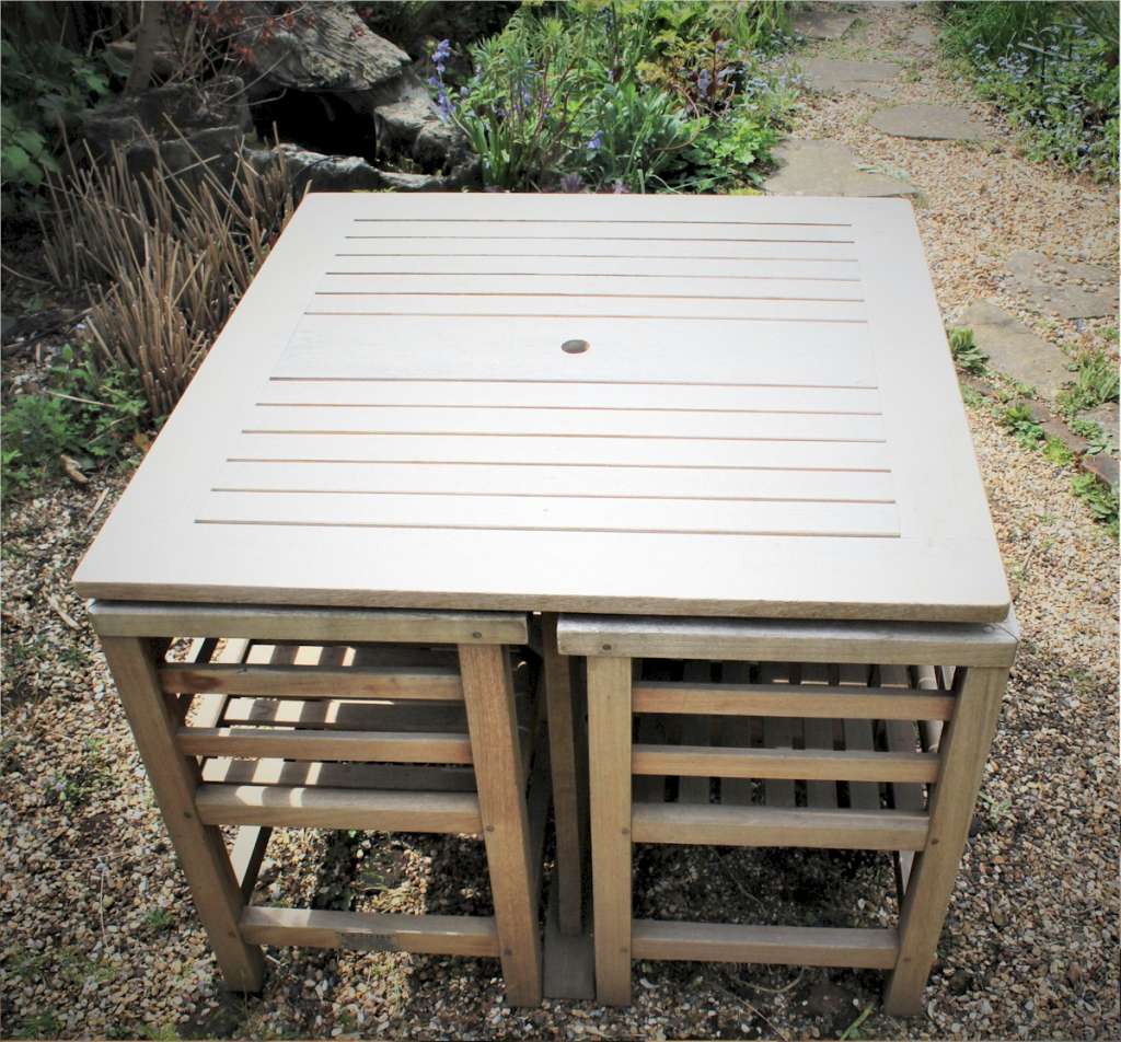 Teak garden table and four corner chairs, SOLD Art Furniture