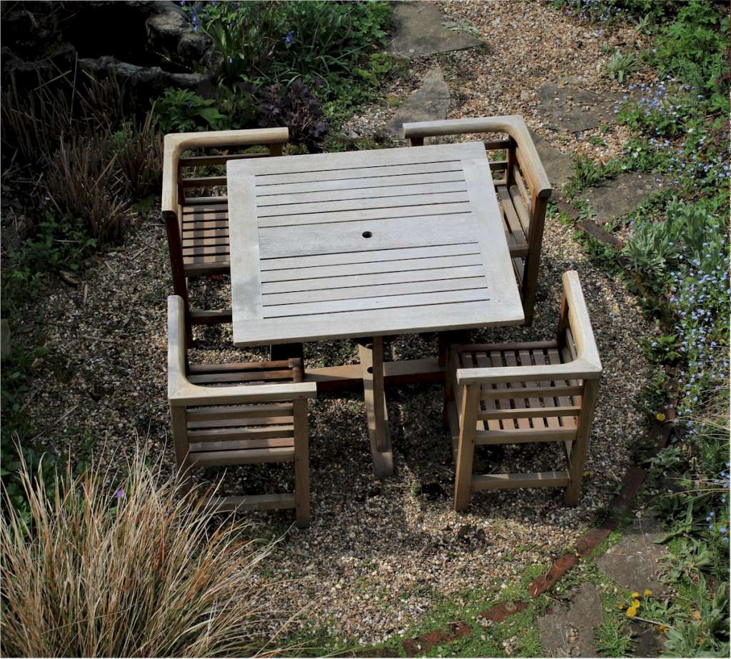 Teak garden table and four corner chairs, SOLD Art Furniture
