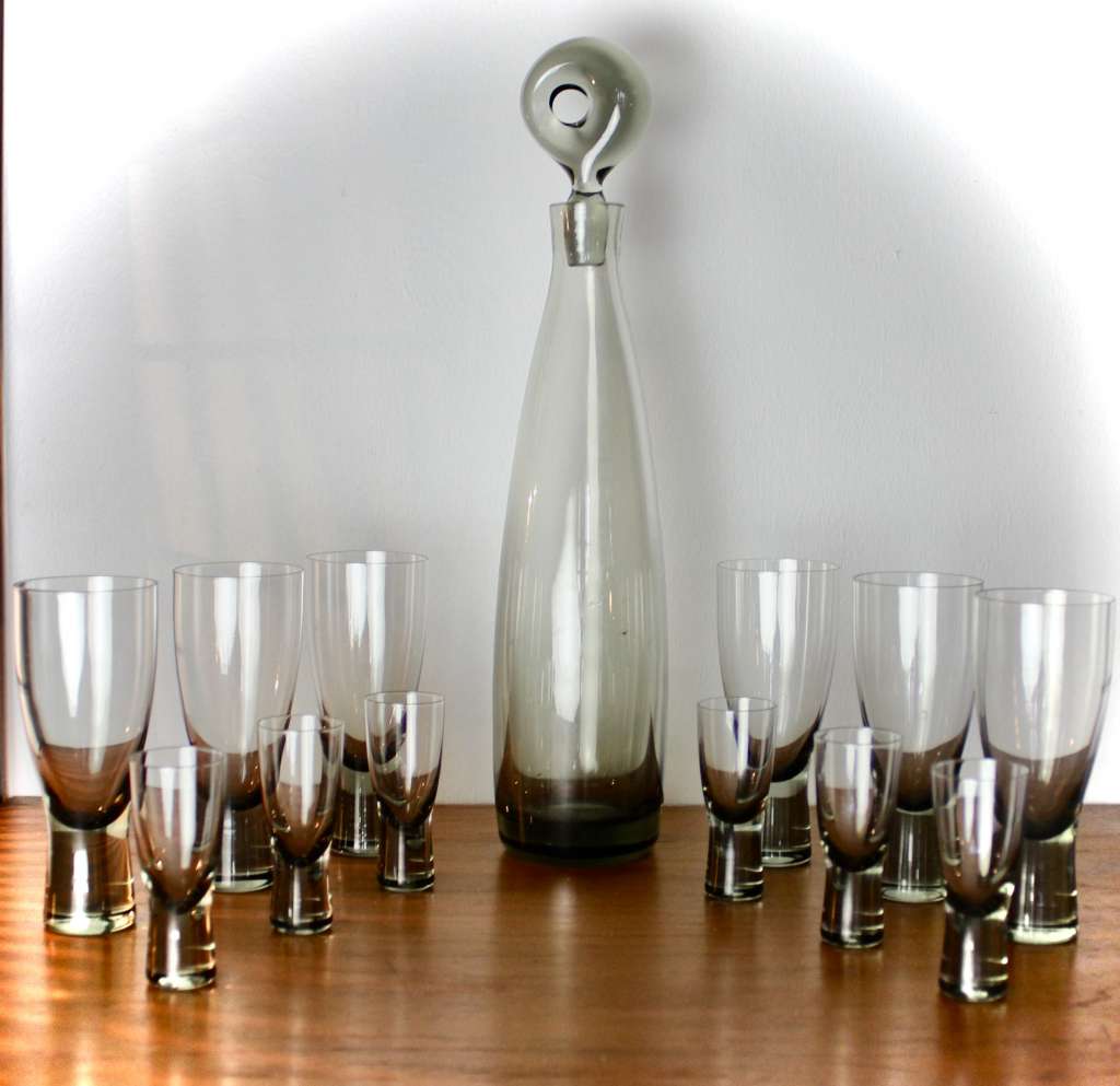 Per Lutken smoky grey glass Aristocrat decanter and twelve glasses.