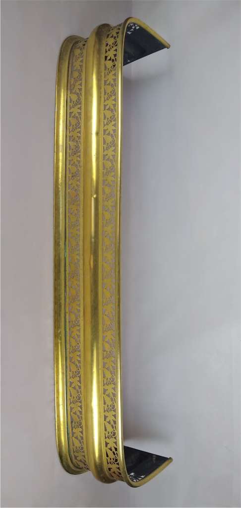 Pretty Edwardian fire fender in brass , vine & grapes