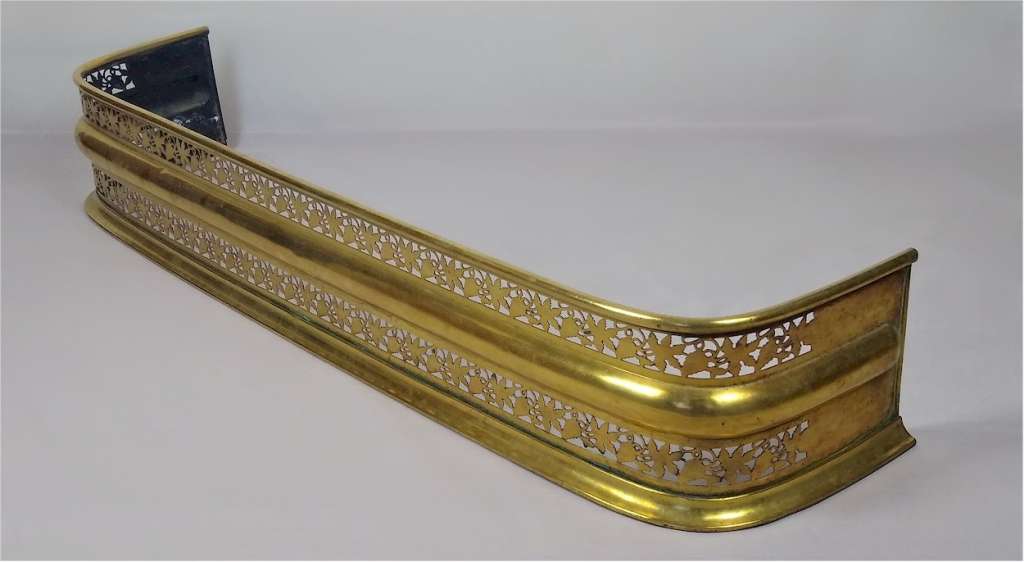 Pretty Edwardian fire fender in brass , vine & grapes