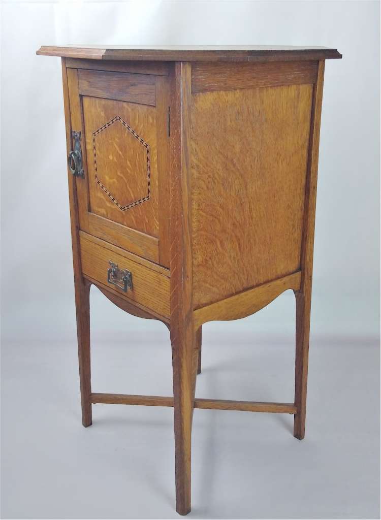 Arts and crafts inlaid cabinet in golden oak