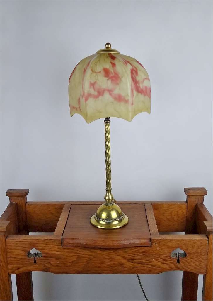 Arts and crafts table lamp in brass with glass shade