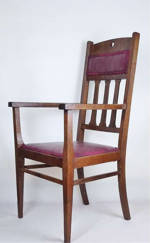 Arts and crafts elbow/desk chair in oak