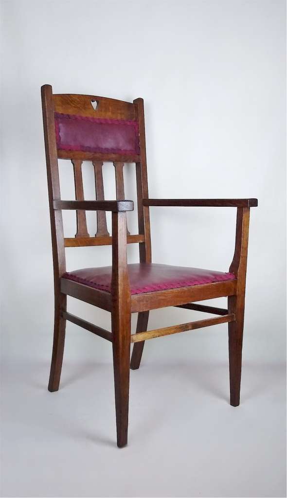 Arts and crafts elbow/desk chair in oak