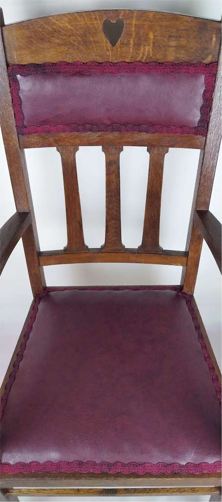 Arts and crafts elbow/desk chair in oak