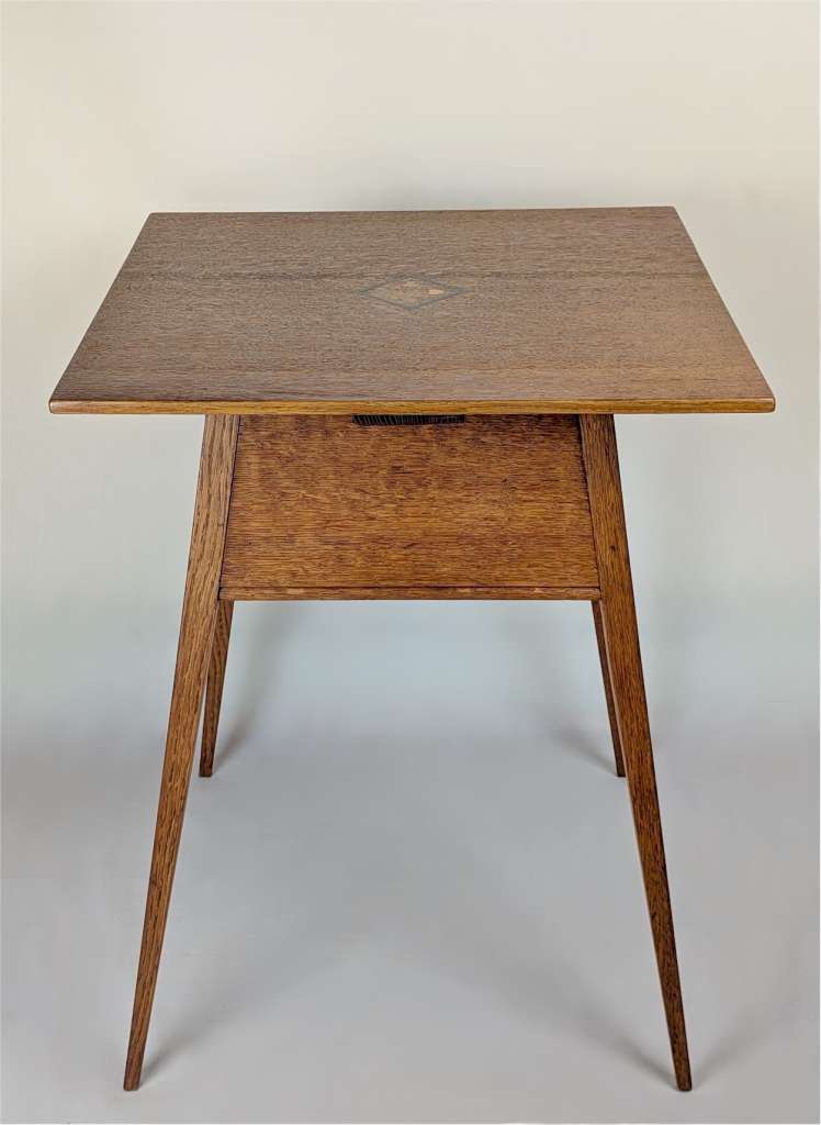 Arts and crafts occasional table with inlaid top