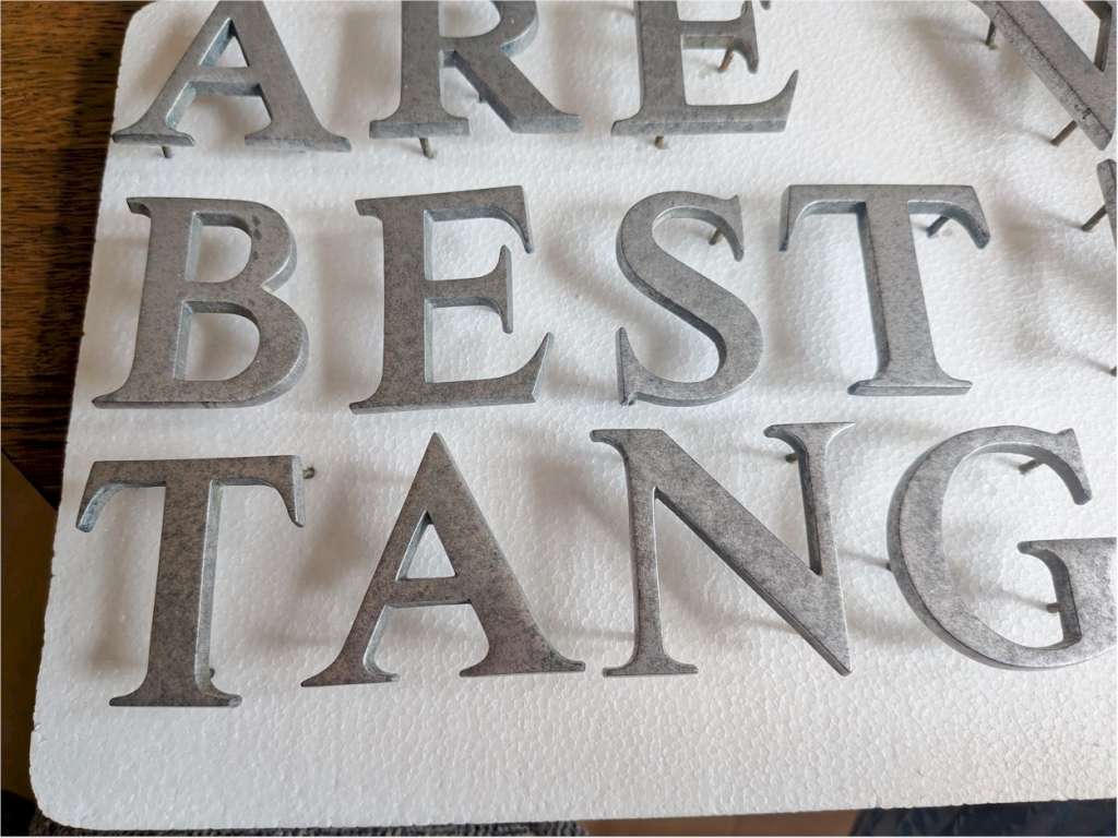 Solid aluminium letters with brass threaded fixings
