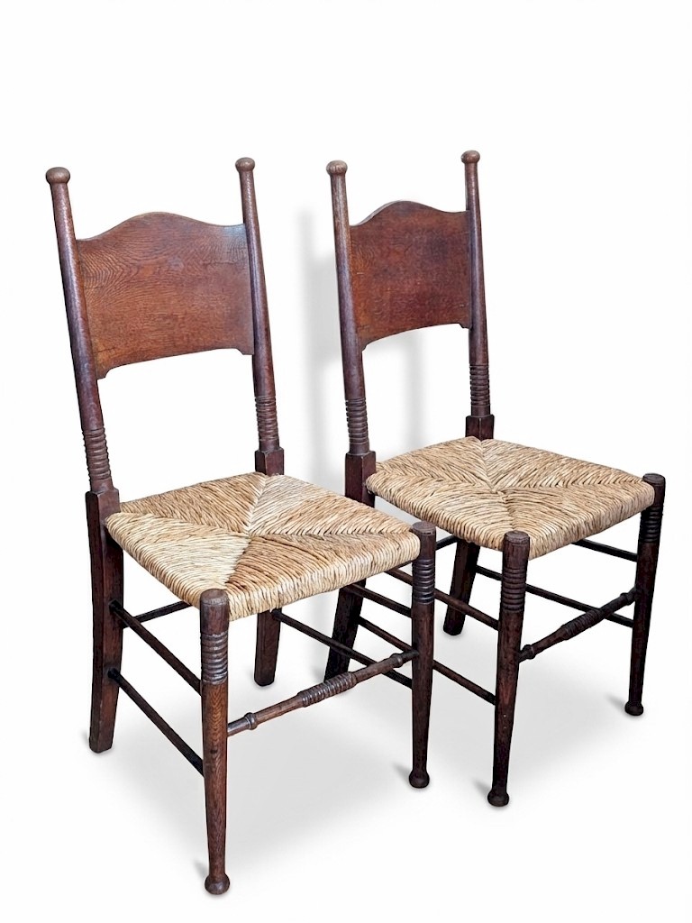 Pair of arts and crafts chairs by William Birch