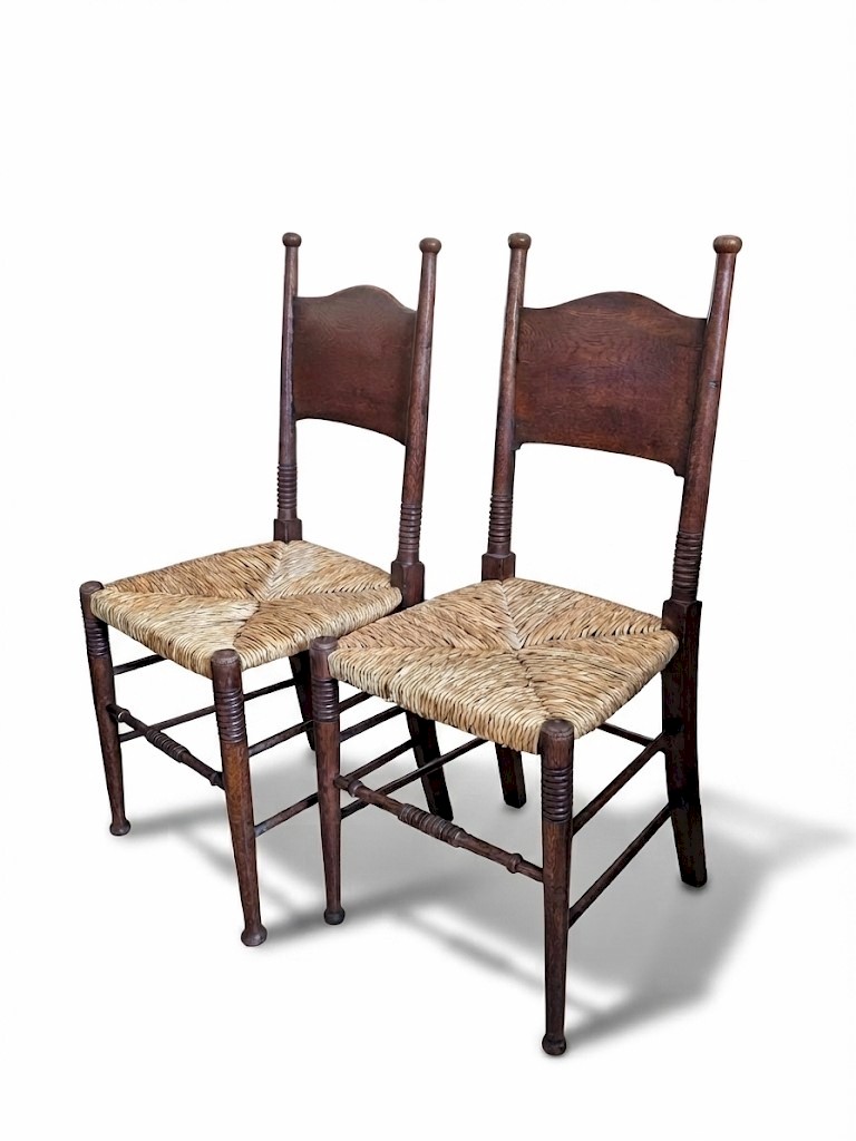 Pair of arts and crafts chairs by William Birch
