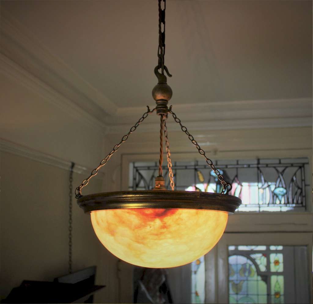 Alabaster ceiling shade bowl with coppered rim,