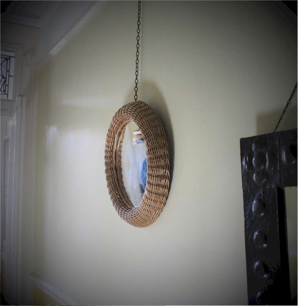 Mid-Century circular wicker mirror in the style of Albini.