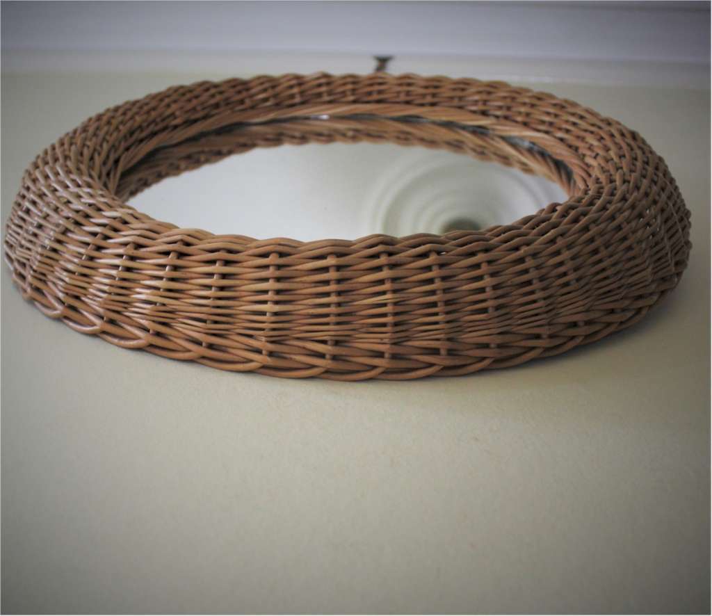 Mid-Century circular wicker mirror in the style of Albini.