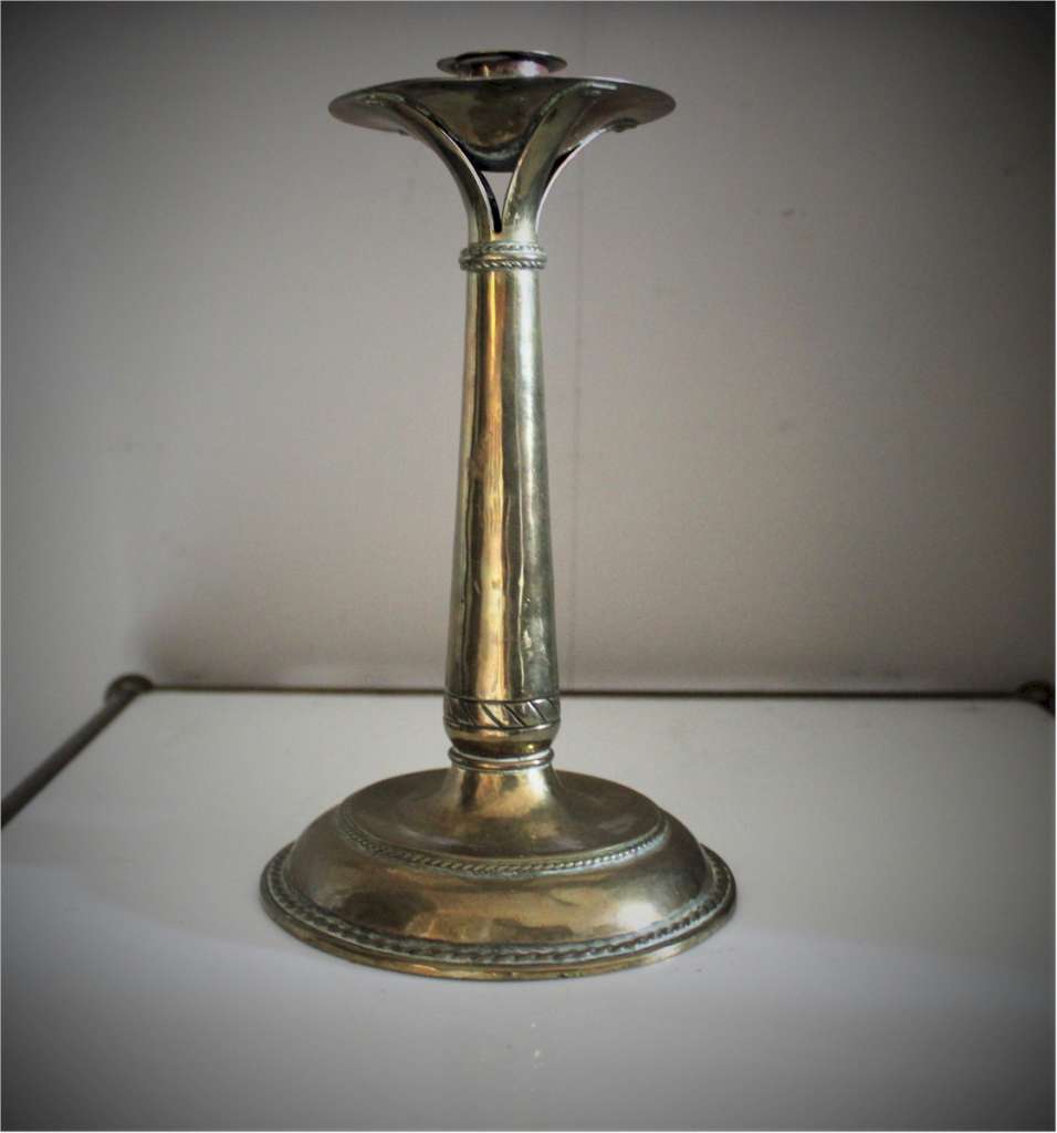 Rare arts and crafts brass candlestick by Alfred Hughes