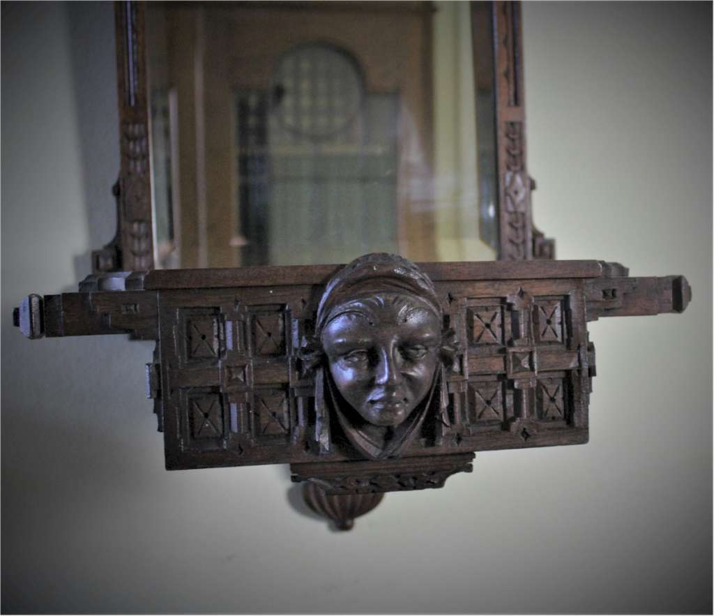 Pair of Aesthetic Movement mahogany mirrored back wall brackets