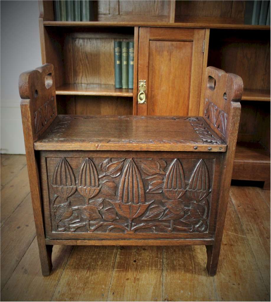 Arts and crafts carved oak slipper box