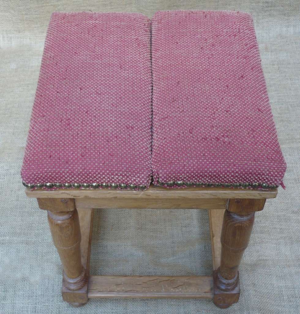 Unusual upholstered stool converts to table