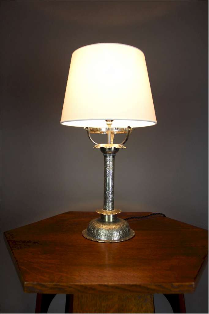 Lovely quality silver plated table lamp with chased decoration