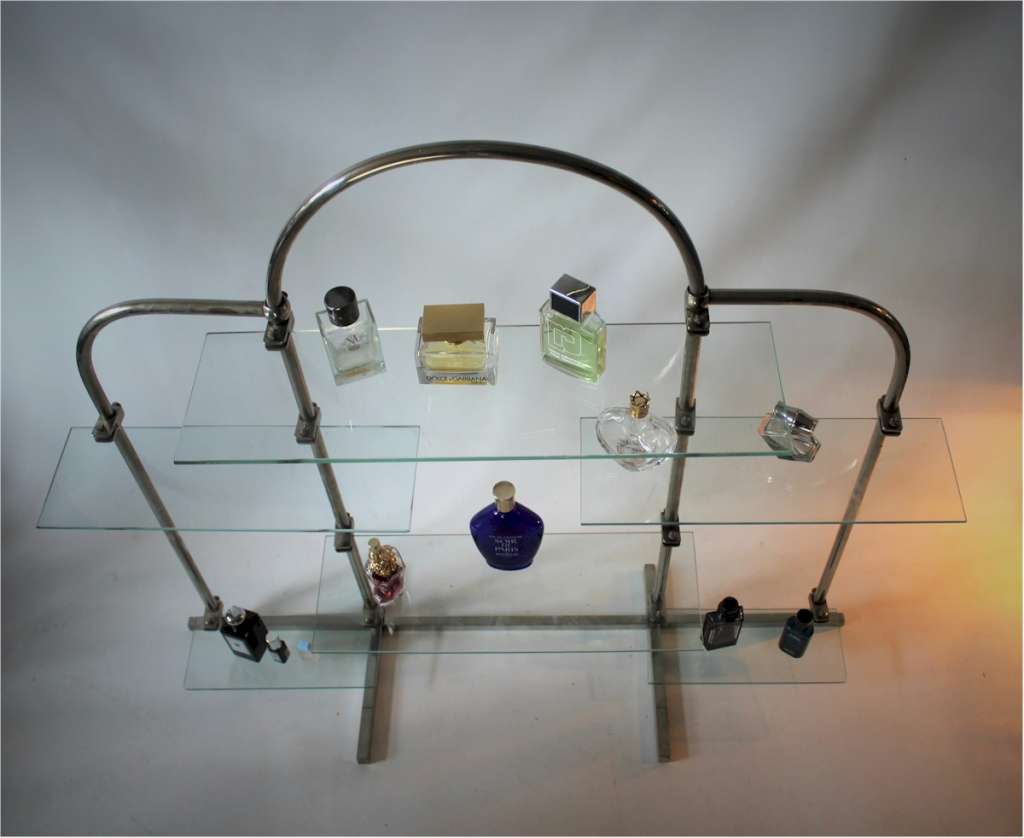 Art Deco chrome shop display stand with adjustable glass shelves