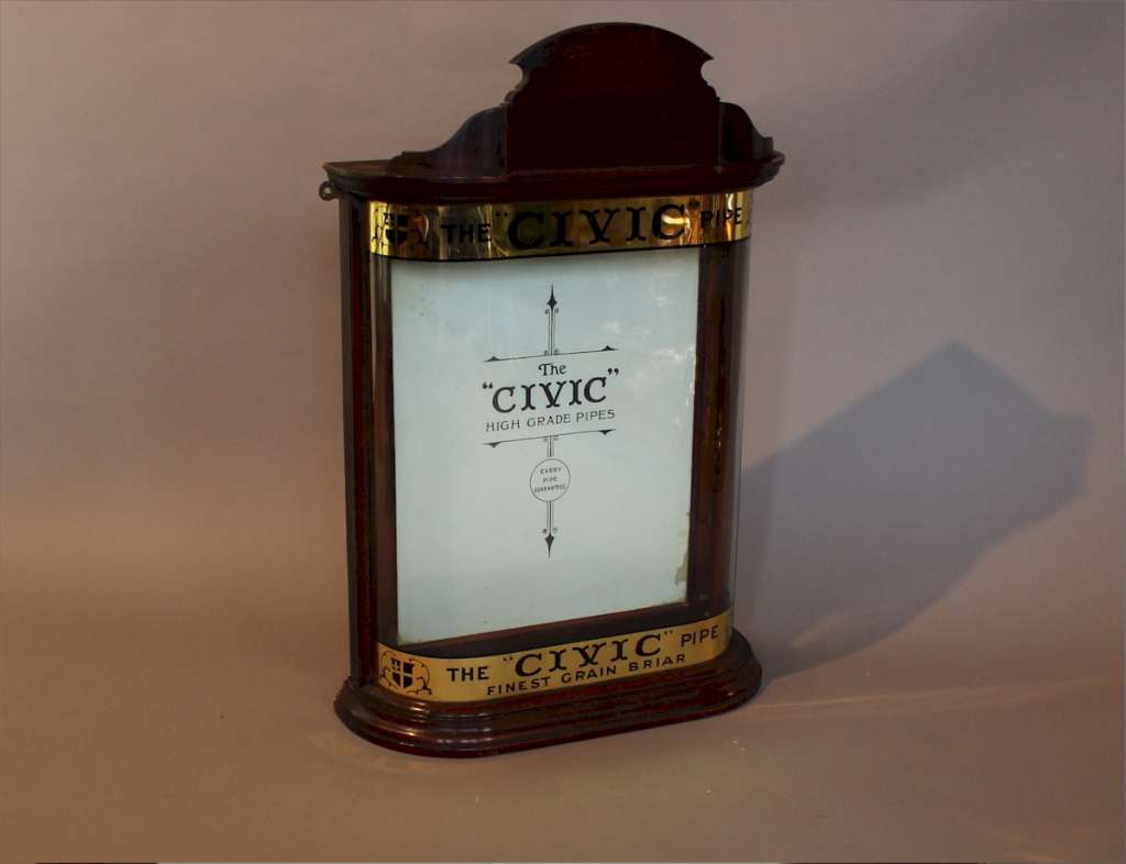 Lovely small bow fronted Civic pipe display cabinet