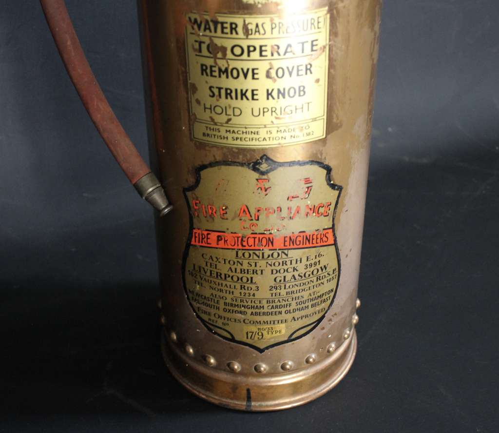Vintage British copper fire extinguisher.