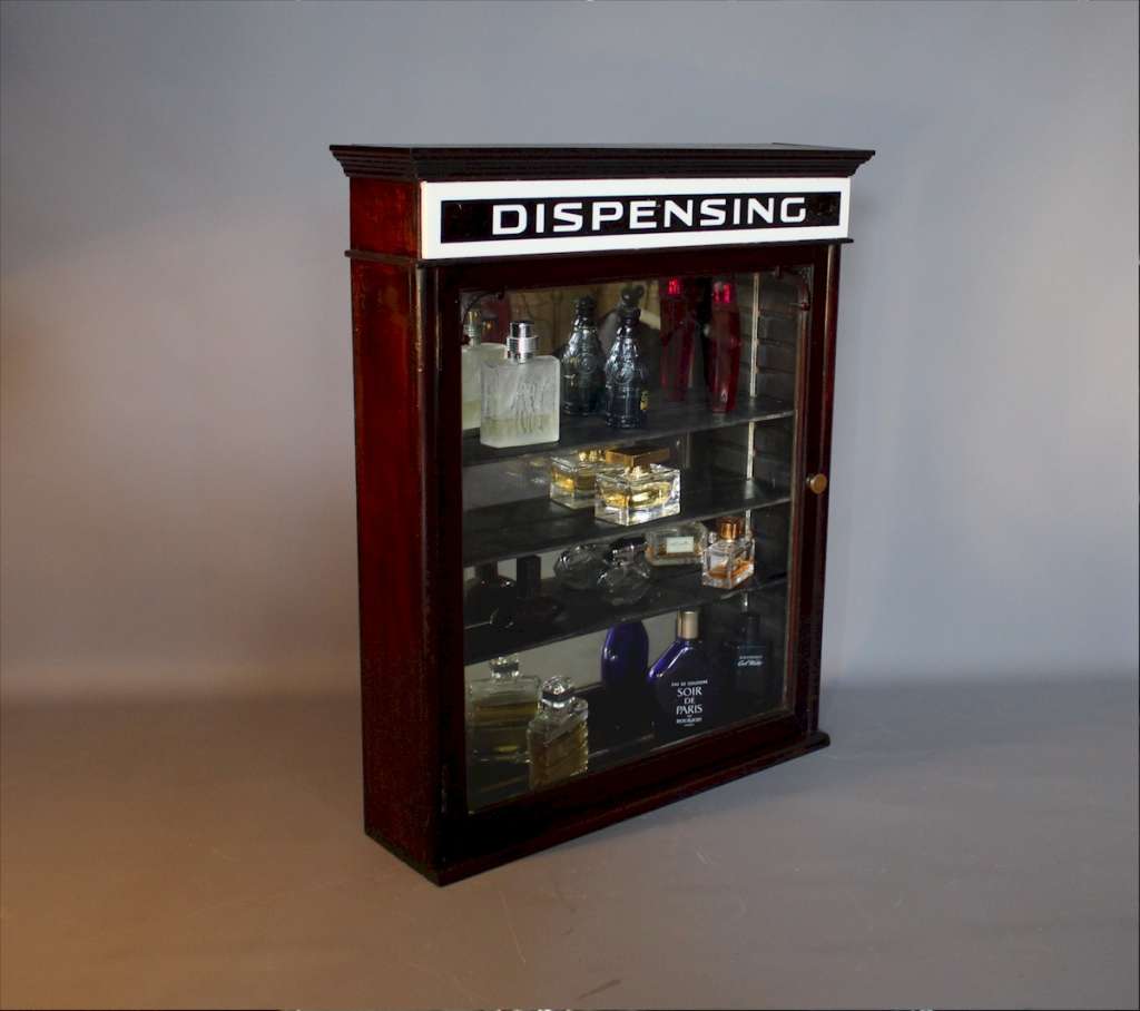 Dispensing cabinet in mahogany c1920 .