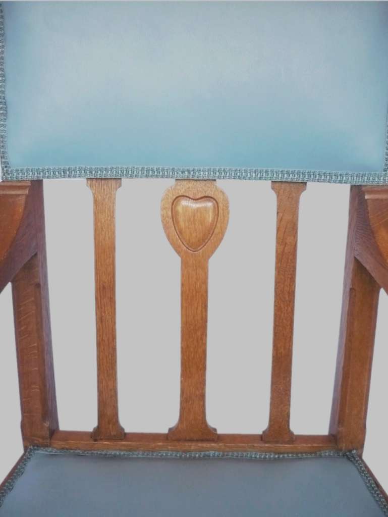 Arts and crafts armchair with carved heart decoration