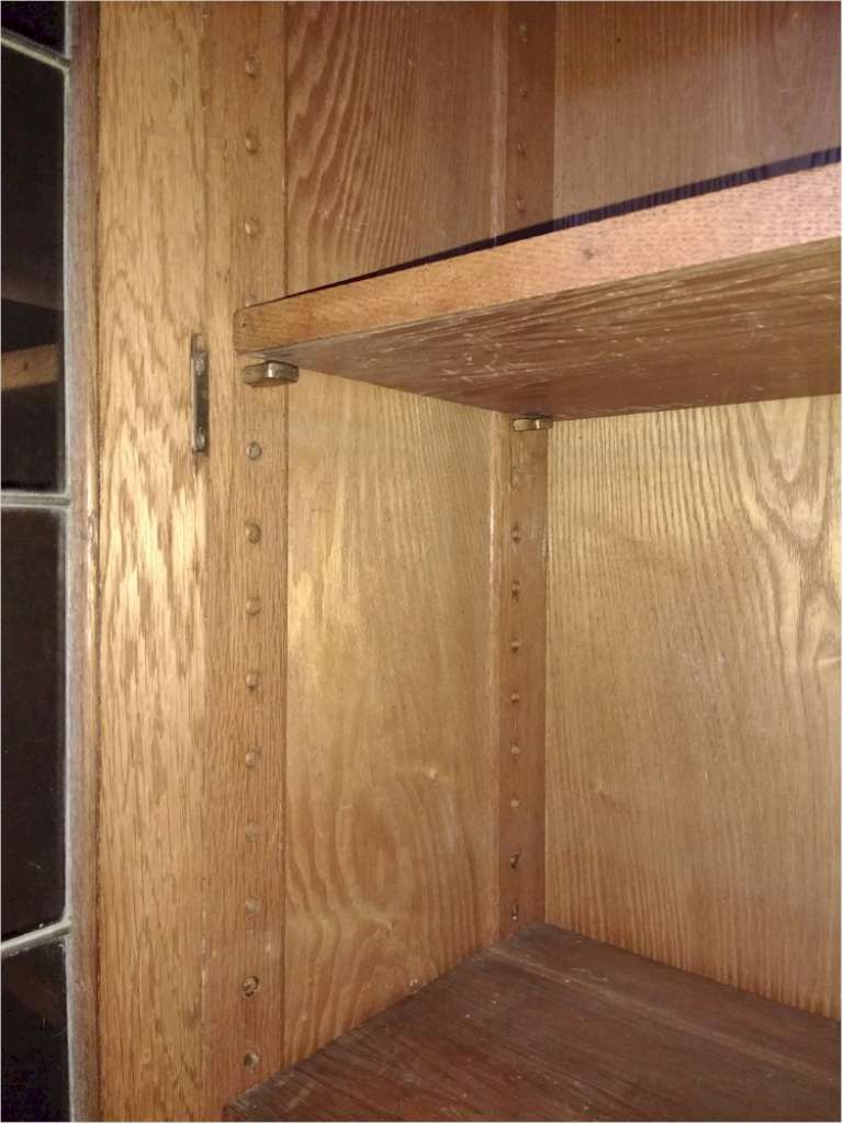 Arts and crafts bookcase , stylised pewter inlay