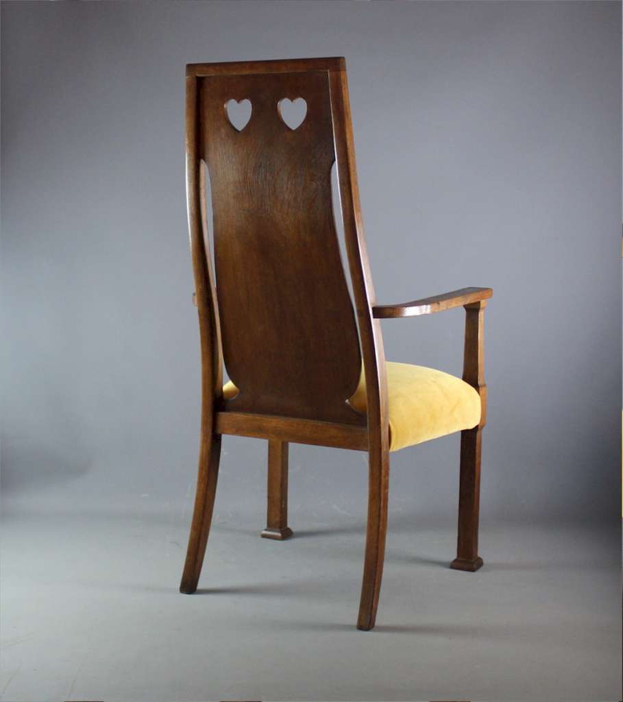 Arts and crafts oak carver chair by Goodyers.
